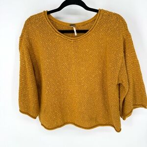Free People when is it called Bohemian cropped oversized Golden Knit Sweater